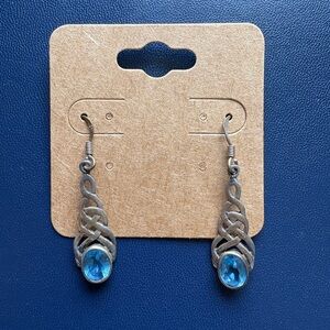 silver knot dangle earrings with blue stone
